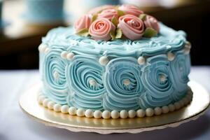 A beautifully decorated cake, it's icing in shades of baby blue and pink. Generative AI photo