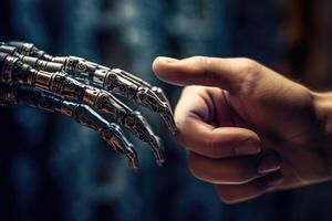 A human hand is reaching out to touch a robotic one. photo