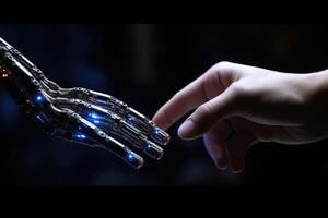 A human hand is reaching out to touch a robotic one. photo
