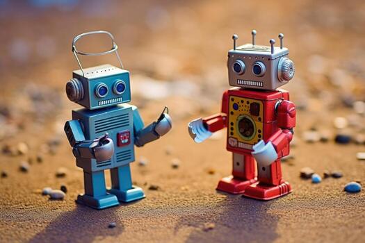 Two retro toy robots engaged in a conversation, placed on either side of a modern smartphone. photo