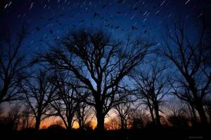 A stunning long - exposure shot of barren trees against the backdrop of a starlit night sky. Generative AI photo