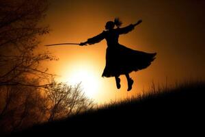 A daring silhouette shot of a witch against the backdrop of a massive, glowing moon. photo