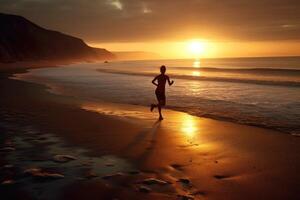 An athlete, running on an isolated beach at the break of dawn. photo