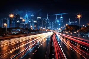 A busy highway at night, trails of light from the moving vehicles creating a dynamic pattern. photo