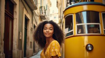 Young beautiful woman posing next to the tram on the streets of Europe photo