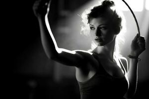 el mujer bailando con gimnástico anillos generativo ai foto