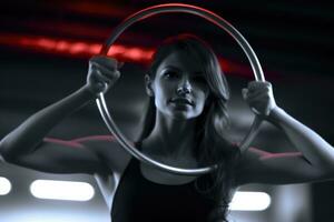 The woman dancing with gymnastic rings. Generative AI photo