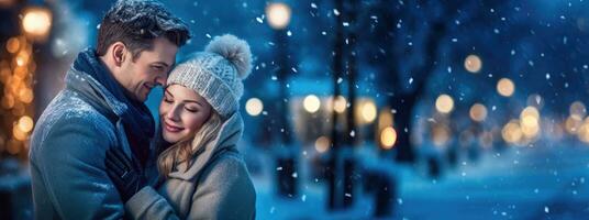 Happy couple posing in the snow on a winter day. Copyspace. photo