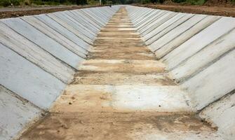 View of the concrete wall, which is built to be attached to the soil. photo