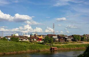 Scenery of many residential houses erected along the banks. photo