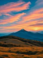 puesta de sol en el montañas con brillante colores foto