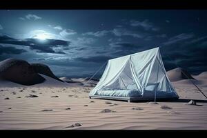 Tent with the moon shining in the night sky photo