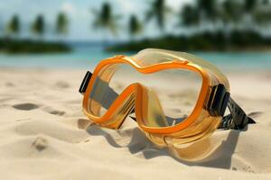 Scuba diving mask on a sandy island against blue ocean photo