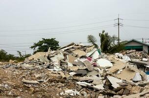 Views of fragments of broken concrete and tile shards that have been demolished. photo