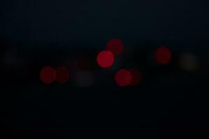 Night city street traffic abstract blurry bokeh lights background photo