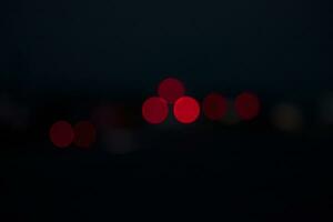 Night city street traffic abstract blurry bokeh lights background photo