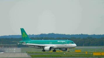 DUSSELDORF, GERMANY JULY 22, 2017 - Aer Lingus Airbus 320 EI DVL taxiing after landing. Dusseldorf Airport, Germany video