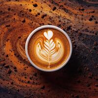 Coffee cup with latte art on coffee beans background. photo