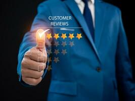 Businessman presses his finger on the check mark to rate five stars. Customer satisfaction survey concept. Service experience ratings. Evaluation of customer service product quality. photo