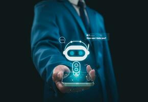 Businessman holding hologram digital chatbot, robot application, conversation assistant, AI Artificial Intelligence concept, digital chatbot on virtual screen.Technology concept. photo