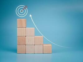 Wood cube block stacking with icon.Concept of business strategy and goal action plan. photo