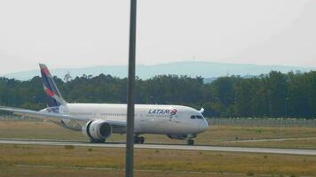 FRANKFURT AM MAIN, GERMANY JULY 18, 2017 - LATAM Airlines Boeing 787 CC BGE taxiing after landing on runway 25R. Fraport, Frankfurt, Germany video