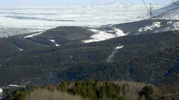 Winter mountains panorama with ski slopes and ski lifts near Belokurikha resort, Altai video