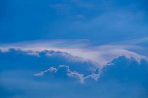 Iridescent Cloud or irisation is a colorful optical phenomenon that occurs in a cloud. photo