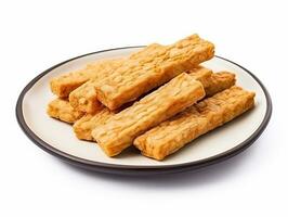 a plate of fried tempeh photo