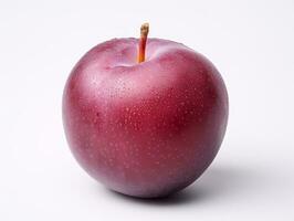 A plum fruit is isolated on a white background photo