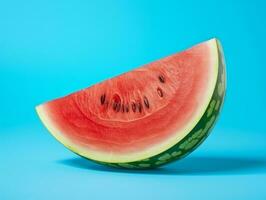 a watermelon isolated on blue background photo