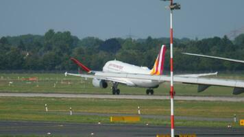 DUSSELDORF, GERMANY JULY 22, 2017 - Turkish Airlines Airbus 330 taxiing before departure and Germanwings airbus A320 take off. Dusseldorf Airport, Germany video