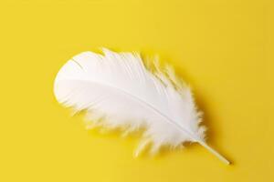 Close up of bright white feather. Copy space, yellow background. Fashion and Party concept. AI Generative photo