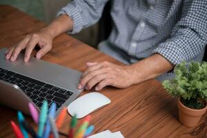 Businessperson using keyboard laptop computer job search, communication social networking, internet online Information, working data marketing concept. photo