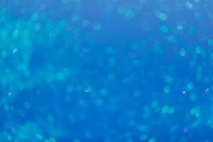 Blue abstract blured background. Merry Christmas or new year bokeh. Copy space photo