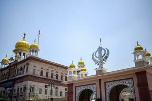 New Delhi, India, May 23 2023 - Gurudwara Sis Ganj Sahib is one of the nine historical Gurdwaras in Old Delhi in India, Sheesh Ganj Gurudwara in Chandni Chowk, opposite Red Fort in Old Delhi India photo