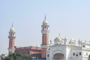 Amritsar, India - May 31 2023 - View of details of architecture inside Golden Temple - Harmandir Sahib in Amritsar, Punjab, India, Famous indian sikh landmark, Golden Temple, the main sanctuary photo