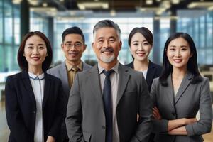 asiático negocio equipo Mira a cámara posando para grupo retrato durante negocio viajar. ai generativo foto