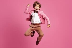 Child in Festive Suit on Pink Background. Concept of Kids Fashion and Clothes Retail. photo
