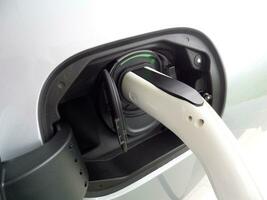 EV car charging with green light indicator photo