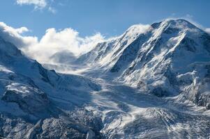 A great grand beautiful glacier. The Gorner Glacier of Zermatt is the second largest glacier in the Alps. A famous place of Switzerland that many tourists come to visit and ski. photo