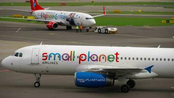 AMSTERDAM, THE NETHERLANDS JULY 29, 2017 - SmallPlanet Airlines Airbus A320 LY SPA taxiing after landing, flight CND620 from Rhodos, Shiphol Airport, Amsterdam, Holland video