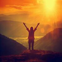 Happy woman with raised hands in the mountain at sunset, created with generative AI photo