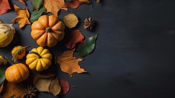 Top View of Thanksgiving day banner design of a collection of pumpkins and other vegetables, photo