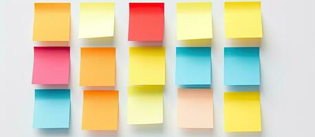 Photo of a colorful display of sticky notes on a wall, offering plenty of space for creative ideas and organization with copy space