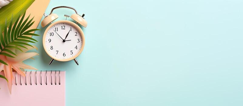 Photo of an alarm clock resting on a comb with empty space for text or design with copy space