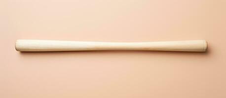 Photo of a wooden baseball bat against a vibrant pink wall with empty space for text or design with copy space