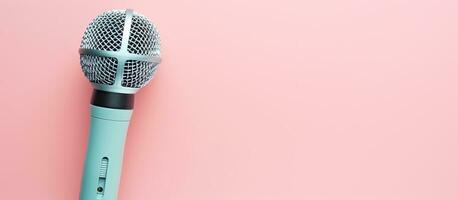 Photo of a microphone in a vibrant pink setting, ready for a performance or recording with copy space