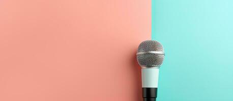 Photo of a microphone on a table with a blank wall behind it with copy space