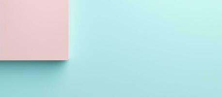 Photo of a pink square object on a vibrant blue and pink background with copy space